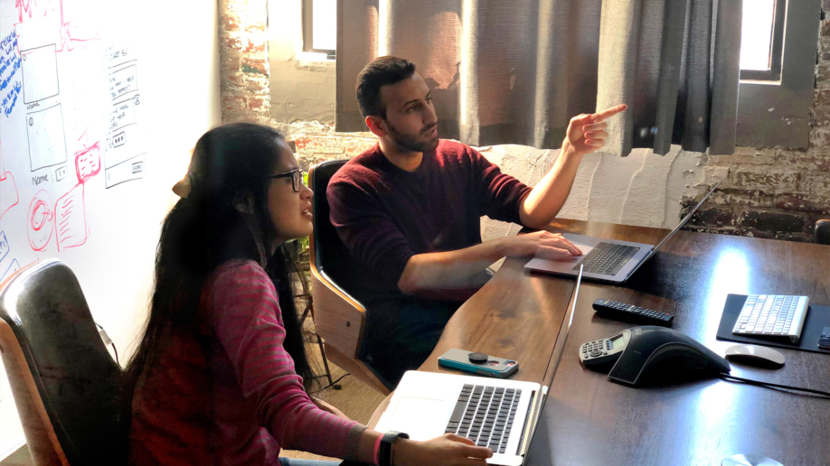 charlene and zuhib in a planning meeting.