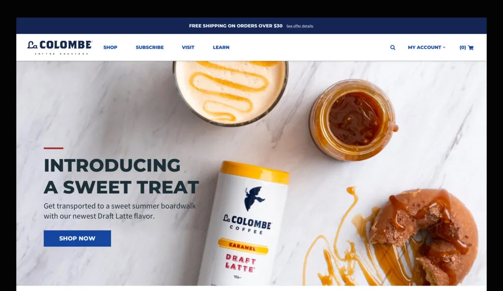 LaColombe's Homepage. Featuring a product shot of their signature draft latte and a call to action to purchase through their shop.