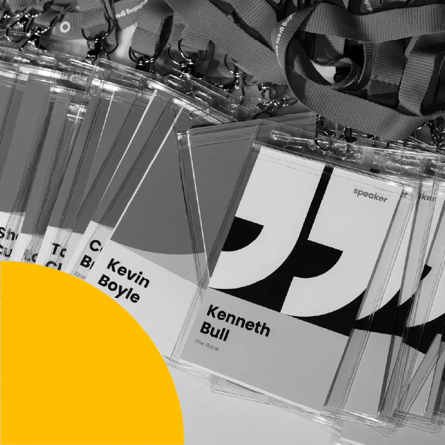 photo of a pile of badges from the 1682 conference